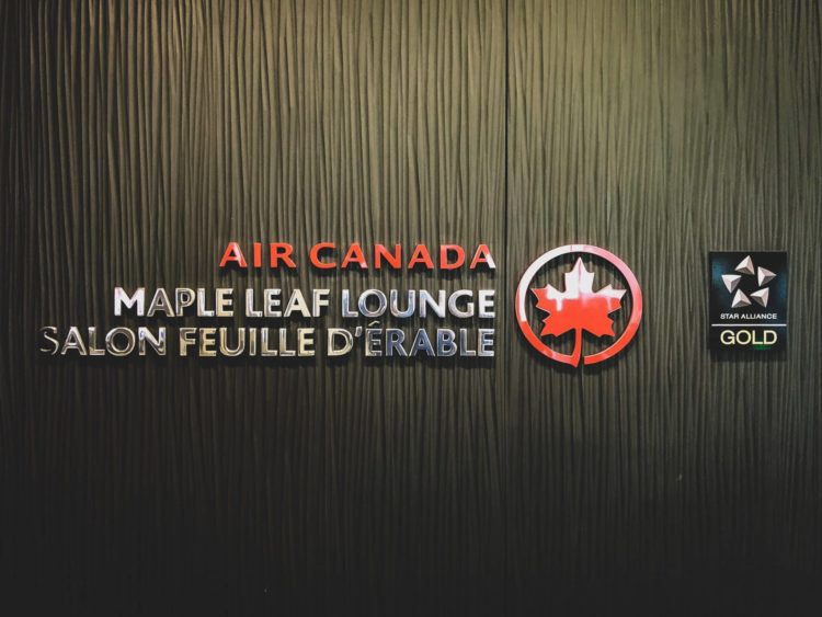 air canada maple leaf lounge calgary logo