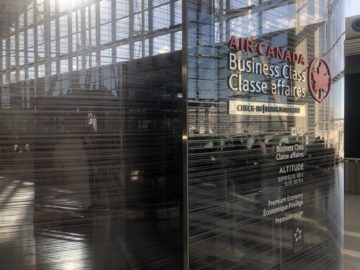 air canada signature suite toronto logo check in